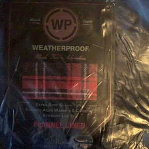 Weatherproof flannel lined, new in plastic pants size 34x32